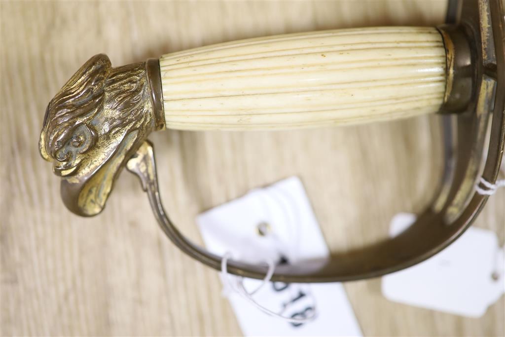 An American infantry officers sword spadroon c.1800, eagle head pommel and slotted guard with traces of gilding, fluted bone